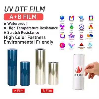 UV Dtf 전송 Ab PET 필름 롤 Ab 필름 전송 Dtf PET A3 30cm UV Dtf 필름